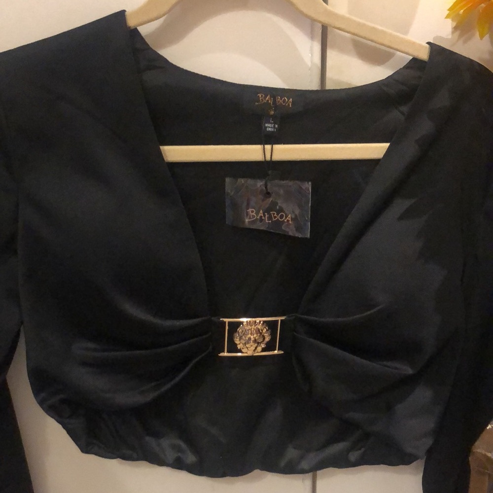 Sexy black crop top with lion hardware with built-in bra cups. - Picture 9 of 14